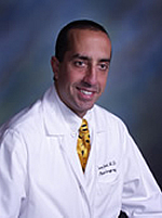 Dr. Tom Pousti Dr. Tom Pousti
